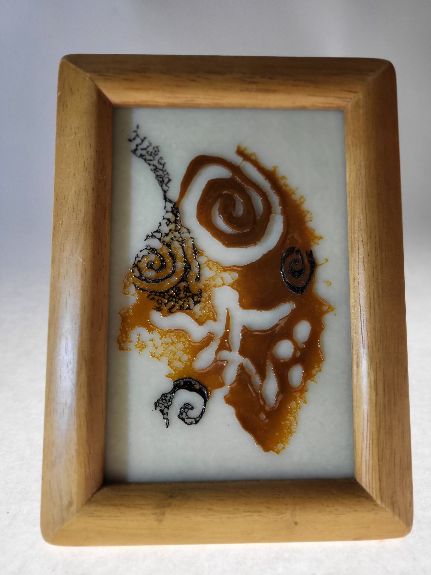 PETROGLYPH - 3 tone spiral abstract
